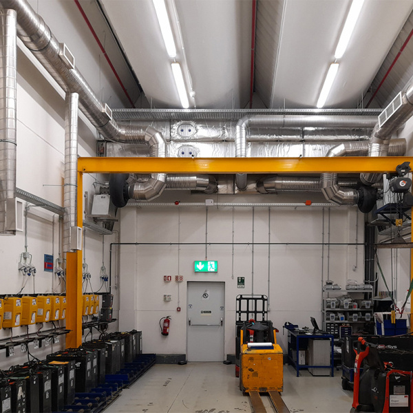 Machines and piping inside a plant room